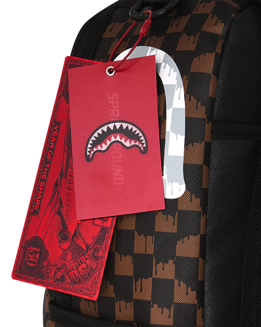 BROWN AND CREAM DRIP CHECK SHARK DLXSV BACKPACK