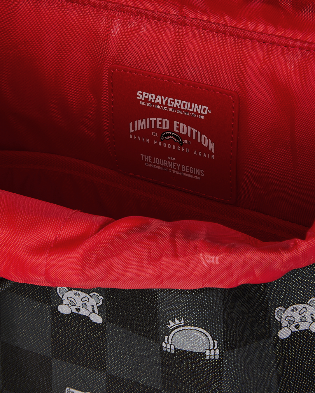 GRAY PEEKING CHARACTER CHECK MONTE CARLO BACKPACK