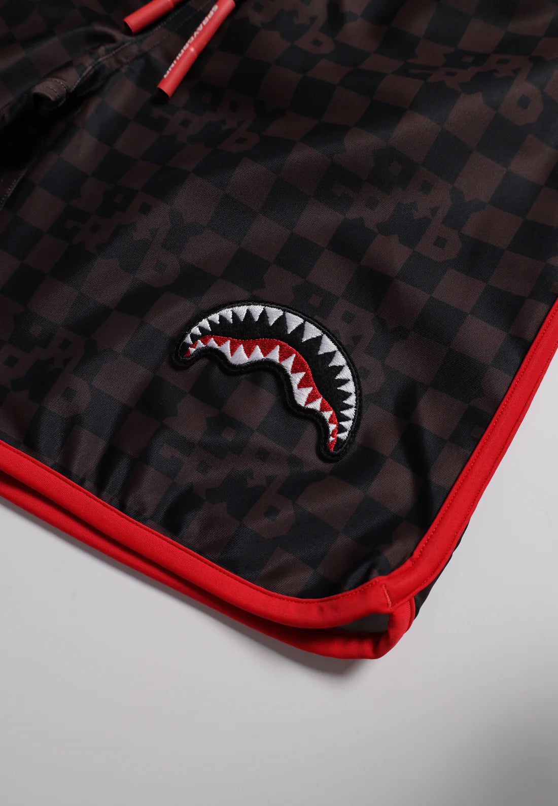 SPRAYGROUND CHECKERED SWIM TRUNKS